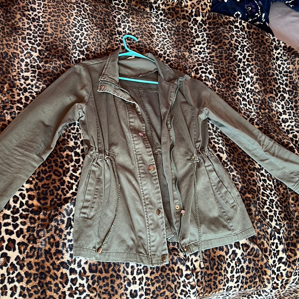 Green zip up jacket